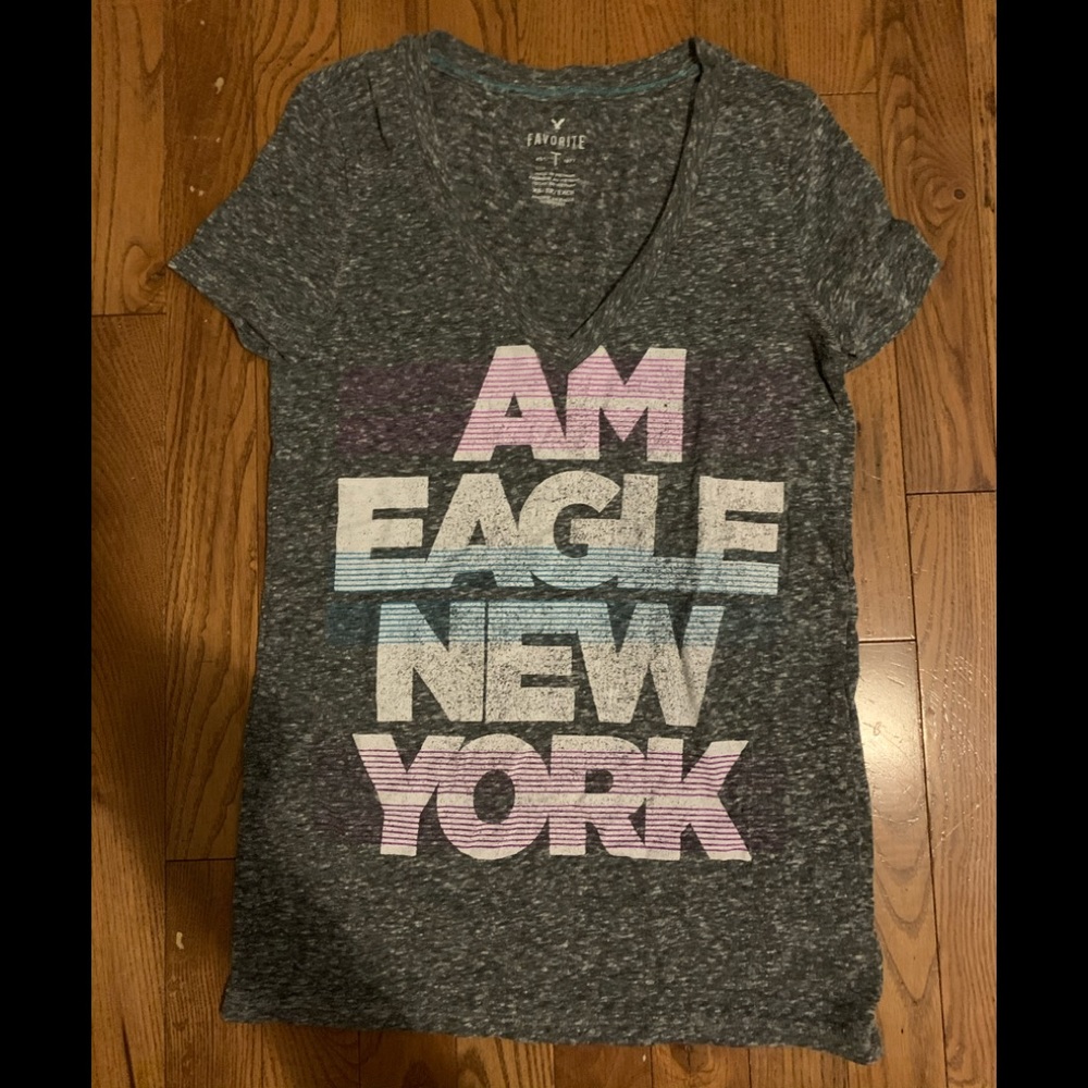 American eagle v neck shirt 👚 size: XS